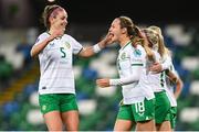 5 December 2023; Kyra Carusa of Republic of Ireland celebrates with teammate Caitlin Hayes, left, after scoring their side's third goal during the UEFA Women's Nations League B match between Northern Ireland and Republic of Ireland at the National Football Stadium at Windsor Park in Belfast. Photo by Stephen McCarthy/Sportsfile
