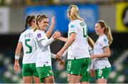 5 December 2023; Louise Quinn of Republic of Ireland celebrates with Jamie Finn, left, after scoring their fifth goal during the UEFA Women's Nations League B match between Northern Ireland and Republic of Ireland at the National Football Stadium at Windsor Park in Belfast. Photo by Stephen McCarthy/Sportsfile