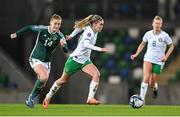 5 December 2023; Jamie Finn of Republic of Ireland and Lauren Wade of Northern Ireland during the UEFA Women's Nations League B match between Northern Ireland and Republic of Ireland at the National Football Stadium at Windsor Park in Belfast. Photo by Stephen McCarthy/Sportsfile