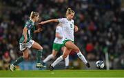 5 December 2023; Ruesha Littlejohn of Republic of Ireland in action against Rebecca Holloway of Northern Ireland during the UEFA Women's Nations League B match between Northern Ireland and Republic of Ireland at the National Football Stadium at Windsor Park in Belfast. Photo by Ramsey Cardy/Sportsfile