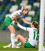 5 December 2023; Kyra Carusa of Republic of Ireland celebrates with Denise O'Sullivan, left, after scoring their side's third goal during the UEFA Women's Nations League B match between Northern Ireland and Republic of Ireland at the National Football Stadium at Windsor Park in Belfast. Photo by Stephen McCarthy/Sportsfile