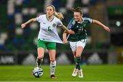 5 December 2023; Megan Connolly of Republic of Ireland in action against Kerry Beattie of Northern Ireland during the UEFA Women's Nations League B match between Northern Ireland and Republic of Ireland at the National Football Stadium at Windsor Park in Belfast. Photo by Ramsey Cardy/Sportsfile