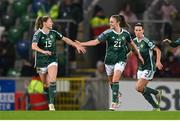 5 December 2023; Kerry Beattie of Northern Ireland celebrates with teammate Rebecca Holloway, left, after scoring their side's first goal during the UEFA Women's Nations League B match between Northern Ireland and Republic of Ireland at the National Football Stadium at Windsor Park in Belfast. Photo by Ramsey Cardy/Sportsfile