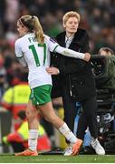 5 December 2023; Republic of Ireland interim head coach Eileen Gleeson with Jamie Finn of Republic of Ireland, after being substituted off, during the UEFA Women's Nations League B match between Northern Ireland and Republic of Ireland at the National Football Stadium at Windsor Park in Belfast. Photo by Stephen McCarthy/Sportsfile