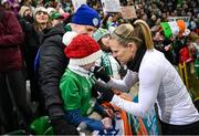5 December 2023; Diane Caldwell of Republic of Ireland with supporters after the UEFA Women's Nations League B match between Northern Ireland and Republic of Ireland at the National Football Stadium at Windsor Park in Belfast. Photo by Ramsey Cardy/Sportsfile