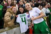 5 December 2023; Louise Quinn of Republic of Ireland gives her match jersey to supporters after the UEFA Women's Nations League B match between Northern Ireland and Republic of Ireland at the National Football Stadium at Windsor Park in Belfast. Photo by Ramsey Cardy/Sportsfile