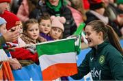 5 December 2023; Tyler Toland of Republic of Ireland with supporters after the UEFA Women's Nations League B match between Northern Ireland and Republic of Ireland at the National Football Stadium at Windsor Park in Belfast. Photo by Ramsey Cardy/Sportsfile