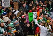 5 December 2023; Diane Caldwell of Republic of Ireland with supporters after the UEFA Women's Nations League B match between Northern Ireland and Republic of Ireland at the National Football Stadium at Windsor Park in Belfast. Photo by Ramsey Cardy/Sportsfile