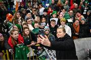 5 December 2023; Ruesha Littlejohn of Republic of Ireland with supporters after the UEFA Women's Nations League B match between Northern Ireland and Republic of Ireland at the National Football Stadium at Windsor Park in Belfast. Photo by Ramsey Cardy/Sportsfile