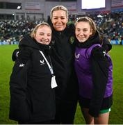 5 December 2023; Republic of Ireland interim assistant coach Emma Byrne, centre, with Republic of Ireland players Freya Healy, left, and Ellen Dolan after the UEFA Women's Nations League B match between Northern Ireland and Republic of Ireland at the National Football Stadium at Windsor Park in Belfast. Photo by Stephen McCarthy/Sportsfile