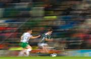5 December 2023; Rebecca McKenna of Northern Ireland in action against Lucy Quinn of Republic of Ireland during the UEFA Women's Nations League B match between Northern Ireland and Republic of Ireland at the National Football Stadium at Windsor Park in Belfast. Photo by Ramsey Cardy/Sportsfile