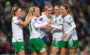 5 December 2023; Caitlin Hayes of Republic of Ireland celebrates with teammates, from left, Jessie Stapleton, Lily Agg, Izzy Atkinson and Kyra Carusa after scoring their side's sixth goal during the UEFA Women's Nations League B match between Northern Ireland and Republic of Ireland at the National Football Stadium at Windsor Park in Belfast. Photo by Ramsey Cardy/Sportsfile