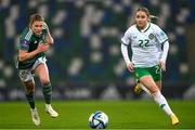 5 December 2023; Izzy Atkinson of Republic of Ireland and Caragh Hamilton of Northern Ireland during the UEFA Women's Nations League B match between Northern Ireland and Republic of Ireland at the National Football Stadium at Windsor Park in Belfast. Photo by Ramsey Cardy/Sportsfile