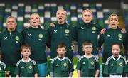 5 December 2023; Republic of Ireland players, from left, Katie McCabe, Courtney Brosnan, Louise Quinn, Caitlin Hayes and Megan Connolly stand for the playing of the National Anthem before the UEFA Women's Nations League B match between Northern Ireland and Republic of Ireland at the National Football Stadium at Windsor Park in Belfast. Photo by Stephen McCarthy/Sportsfile