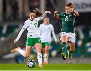 5 December 2023; Heather Payne of Republic of Ireland in action against Marissa Callaghan of Northern Ireland during the UEFA Women's Nations League B match between Northern Ireland and Republic of Ireland at the National Football Stadium at Windsor Park in Belfast. Photo by Stephen McCarthy/Sportsfile
