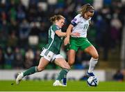 5 December 2023; Katie McCabe of Republic of Ireland in action against Caragh Hamilton of Northern Ireland during the UEFA Women's Nations League B match between Northern Ireland and Republic of Ireland at the National Football Stadium at Windsor Park in Belfast. Photo by Stephen McCarthy/Sportsfile