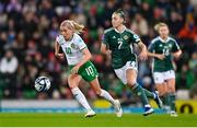 5 December 2023; Denise O'Sullivan of Republic of Ireland in action against Chloe McCarron of Northern Ireland during the UEFA Women's Nations League B match between Northern Ireland and Republic of Ireland at the National Football Stadium at Windsor Park in Belfast. Photo by Stephen McCarthy/Sportsfile