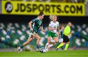 5 December 2023; Rebecca McKenna of Northern Ireland in action against Denise O'Sullivan of Republic of Ireland during the UEFA Women's Nations League B match between Northern Ireland and Republic of Ireland at the National Football Stadium at Windsor Park in Belfast. Photo by Stephen McCarthy/Sportsfile