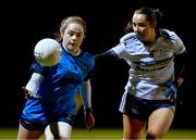 7 December 2023; Maedbh Monaghan of UCD in action against Holly McQuaid of UL during the 3rd Level Ladies Football League Division 2 final match between UCD and Ulster University at Dundalk Institute of Technology in Dundalk, Louth. Photo by Ben McShane/Sportsfile