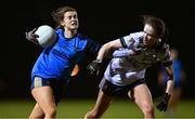 7 December 2023; Aisling Walls of UCD in action against Lauren Garland of UL during the 3rd Level Ladies Football League Division 2 final match between UCD and Ulster University at Dundalk Institute of Technology in Dundalk, Louth. Photo by Ben McShane/Sportsfile