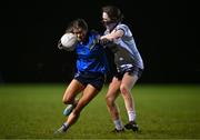 7 December 2023; Aisling Walls of UCD in action against Lauren Garland of UL during the 3rd Level Ladies Football League Division 2 final match between UCD and Ulster University at Dundalk Institute of Technology in Dundalk, Louth. Photo by Ben McShane/Sportsfile