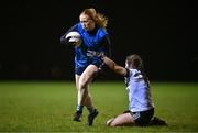 7 December 2023; Jodi Egan of UCD in action against Lauren Garland of UL during the 3rd Level Ladies Football League Division 2 final match between UCD and Ulster University at Dundalk Institute of Technology in Dundalk, Louth. Photo by Ben McShane/Sportsfile