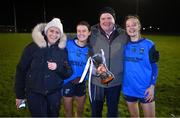 7 December 2023; Aisling Walls of UCD with her mother Cathleen, father Frank and Clodagh Kennedy of UCD with the cup after the 3rd Level Ladies Football League Division 2 final match between UCD and Ulster University at Dundalk Institute of Technology in Dundalk, Louth. Photo by Ben McShane/Sportsfile