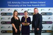 8 December 2023; Bernie Duggan accepts the Women’s Personality of the Year award, on behalf of her daughter Karen Duggan of Peamount United, from Ashley Morrow, head of brand, advertising and sponsorship at SSE Airtricity; left, in the company of Peamount United manager James O'Callaghan during the SSE Airtricity / Soccer Writers Ireland Awards 2023 at the Dublin Royal Convention Centre in Dublin. Photo by Stephen McCarthy/Sportsfile