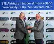 8 December 2023; Liam Brady is presented with the International Achievement Award by Philip Quinn during the SSE Airtricity / Soccer Writers Ireland Awards 2023 at the Dublin Royal Convention Centre in Dublin. Photo by Stephen McCarthy/Sportsfile