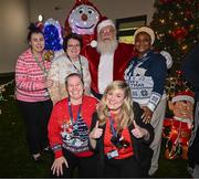 8 December 2023; Members of staff at Children’s Health Ireland with Santa Claus during the turning on of the official Christmas Lights at Children’s Health Ireland at Connolly in Blanchardstown, Dublin. This Christmas, support can help give children & teenagers the very best chance in Children's Health Ireland at Crumlin, Temple Street, Tallaght & Connolly. Donations can be made at www.childrenshealth.ie. Photo by Harry Murphy/Sportsfile  *** Local Caption *** NOPRINTSALES