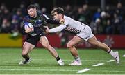 8 December 2023; Andrew Smith of Connacht evades the tackle of Damian Penaud of Bordeaux-Begles during the Investec Champions Cup Pool 1 Round 1 match between Connacht and Bordeaux-Begles at The Sportsground in Galway. Photo by Seb Daly/Sportsfile
