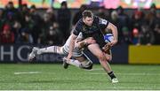 8 December 2023; Cathal Forde of Connacht is tackled by Pierre Bochaton of Bordeaux-Begles during the Investec Champions Cup Pool 1 Round 1 match between Connacht and Bordeaux-Begles at The Sportsground in Galway. Photo by Seb Daly/Sportsfile