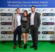 8 December 2023; Ripple staff, from left, Eoin Kelly, Emma Kate Rowlette and Eoin MacNamee during the SSE Airtricity / Soccer Writers Ireland Awards 2023 at the Dublin Royal Convention Centre in Dublin. Photo by Stephen McCarthy/Sportsfile