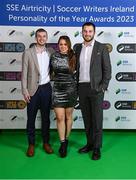 8 December 2023; Ripple staff, from left, Eoin Kelly, Emma Kate Rowlette and Eoin MacNamee during the SSE Airtricity / Soccer Writers Ireland Awards 2023 at the Dublin Royal Convention Centre in Dublin. Photo by Stephen McCarthy/Sportsfile