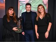 8 December 2023; Shamrock Rovers manager Stephen Bradley is presented with the Men’s Personality of the Year award by Ashley Morrow, head of brand, advertising and sponsorship at SSE Airtricity; right, and Ursula McCaffrey, daughter of the first winner Dan McCaffrey, left, during the SSE Airtricity / Soccer Writers Ireland Awards 2023 at the Dublin Royal Convention Centre in Dublin. Photo by Stephen McCarthy/Sportsfile
