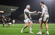 8 December 2023; Bordeaux-Begles players Maxime Lamothe, left, and Damian Penaud celebrate their side's sixth try, scored by teammate Pablo Uberti, not pictured, during the Investec Champions Cup Pool 1 Round 1 match between Connacht and Bordeaux-Begles at The Sportsground in Galway. Photo by Seb Daly/Sportsfile