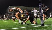 8 December 2023; Pablo Uberti of Bordeaux-Begles scores his side's sixth try, despite the tackle of Connacht's John Porch, during the Investec Champions Cup Pool 1 Round 1 match between Connacht and Bordeaux-Begles at The Sportsground in Galway. Photo by Seb Daly/Sportsfile