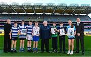 9 December 2023; Pictured is Allianz sponsorship executive Katie Bradley, James Hayden of Cumann na mBunscol, Allianz customer relationship executive Sean Doolin with Malachy Treacy, Hugo Ryan and Harry Dunne, Willow Park NS, Sean van der Lee of Belgrove NS and Matt Broderick of St Pius NS and Caoimhe Cullen Murphy from St Laurence's National School at the 2023 Allianz Cumann Na mBunscol Annual Football Awards at Croke Park in Dublin. Photo by Eóin Noonan/Sportsfile