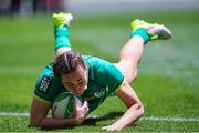 9 December 2023; Eve Higgins of Ireland scores a try during the Women's Pool B match between Ireland and Great Britain during the HSBC SVNS Rugby Tournament at DHL Stadium in Cape Town, South Africa. Photo by Shaun Roy/Sportsfile