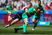 9 December 2023; Harry McNulty of Ireland is tackled by Jamie Barden of Great Britain during the Men's Pool A match between Ireland and Great Britain during the HSBC SVNS Rugby Tournament at DHL Stadium in Cape Town, South Africa. Photo by Shaun Roy/Sportsfile