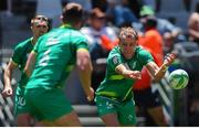 9 December 2023; Niall Comerford of Ireland passes the ball to team-mate Billy Dardis during the Men's Pool A match between Ireland and Great Britain during the HSBC SVNS Rugby Tournament at DHL Stadium in Cape Town, South Africa. Photo by Shaun Roy/Sportsfile