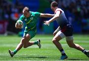 9 December 2023; Niall Comerford of Ireland in action against Alex Davis of Great Britain during the Men's Pool A match between Ireland and Great Britain during the HSBC SVNS Rugby Tournament at DHL Stadium in Cape Town, South Africa. Photo by Shaun Roy/Sportsfile