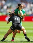 9 December 2023; Amee-Leigh Murphy Crowe of Ireland is tackled by Michaela Blyde of New Zealand during the Women's Pool B match between New Zealand and Ireland during the HSBC SVNS Rugby Tournament at DHL Stadium in Cape Town, South Africa. Photo by Shaun Roy/Sportsfile