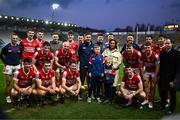 9 December 2023; Cork players with Sinead McCarthy, daughter of the late Teddy McCarthy, and Chairperson Cork GAA Marc Sheehan after the Teddy McCarthy Football Tribute Game between Cork and Meath at Páirc Uí Chaoimh in Cork. Photo by Eóin Noonan/Sportsfile