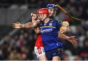 9 December 2023; Tom Monaghan of Galway is tackled by Sean O'Donoghue of Cork during the Teddy McCarthy Hurling Tribute Game between Cork and Galway at Páirc Uí Chaoimh in Cork. Photo by Eóin Noonan/Sportsfile