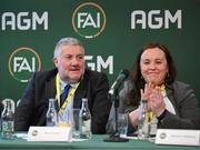 9 December 2023; Paul Cooke reacts as he is announced the newly elected FAI president, also included is FAI board member Niamh O’Mahony, during the annual general meeting of the Football Association of Ireland at the Radisson Blu St. Helen's Hotel in Dublin. Photo by Stephen McCarthy/Sportsfile