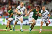 9 December 2023; Gavin Mullin of Ireland on the attack during the Men's Pool A match between South Africa and Ireland during the HSBC SVNS Rugby Tournament at DHL Stadium in Cape Town, South Africa. Photo by Shaun Roy/Sportsfile