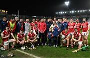 9 December 2023; Cork players with Sinead McCarthy, daughter of the late Teddy McCarthy, and Chairperson Cork GAA Marc Sheehan, after the Teddy McCarthy Hurling Tribute Game between Cork and Galway at Páirc Uí Chaoimh in Cork. Photo by Eóin Noonan/Sportsfile