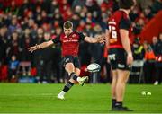 9 December 2023; Jack Crowley of Munster attempts a last minute drop goal, while wearing only one boot, during the Investec Champions Cup Pool 3 Round 1 match between Munster and Aviron Bayonnais at Thomond Park in Limerick. Photo by Brendan Moran/Sportsfile