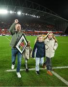 9 December 2023; Recently retired Munster player Keith Earls, accompanied by his daughters Ella-May, Laurie and Emie, are introduced to the crowd at half-time during the Investec Champions Cup Pool 3 Round 1 match between Munster and Aviron Bayonnais at Thomond Park in Limerick. Photo by Brendan Moran/Sportsfile